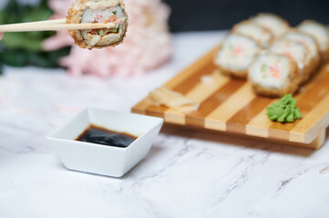 Sushi Rolls on the board beautiful view
