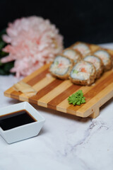 Sushi Rolls on the board beautiful view
