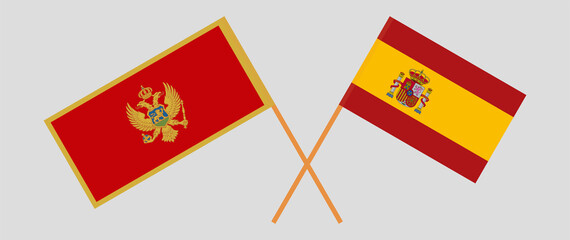 Crossed flags of Montenegro and Spain. Official colors. Correct proportion