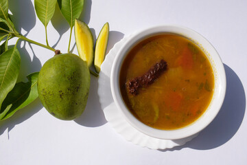 Tasty ugadi special traditonal telangana or andhra dish called Kattu charu made from raw mangoes...