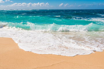 Fototapeta na wymiar Beautiful beach and tropical sea. Sand and water vacation background.