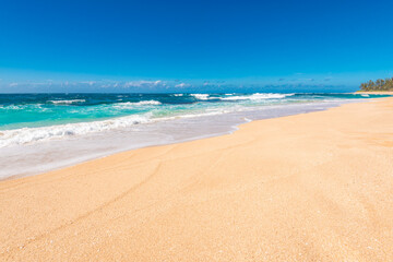 Beautiful beach and tropical sea. Sand and water vacation background.