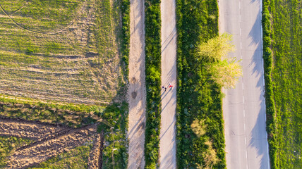 people walk rural road, top view