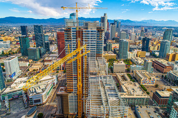 Aerial Shot of Downtown Los Angeles California. Beautiful stunning views of Downtown High Rise buildings and Rooftop Helipads. Beautiful Sunny day.