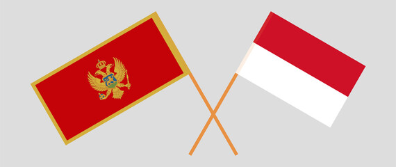 Crossed flags of Montenegro and Indonesia. Official colors. Correct proportion