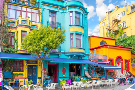 A street full of colorful shops and cafes in the historic Sultanahmet district of Istanbul, Turkey.