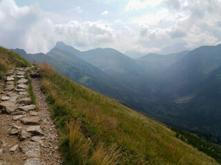 Naklejka na ściany i meble Steep path in the mountains