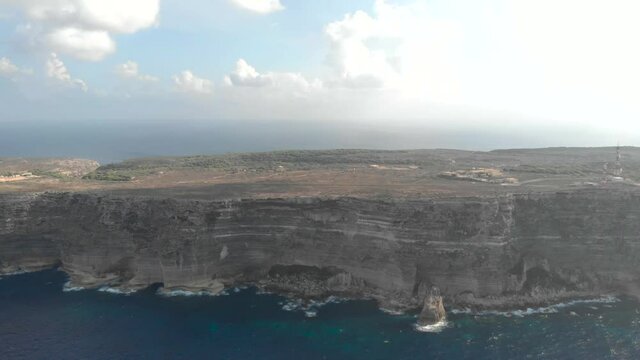 Aerial shot Lampedusa Island (Drone 4k), seagulls, isola dei conigli at sunset - concept of paradise on earth, happiness and travel to beautiful places