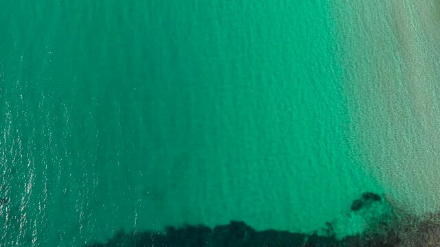 Aerial shot Lampedusa Island (Drone 4k), seagulls, isola dei conigli at sunset - concept of paradise on earth, happiness and travel to beautiful places