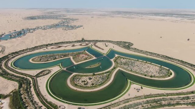 Drone footage of Love Lake near Dubai in the desert, artificial body of water