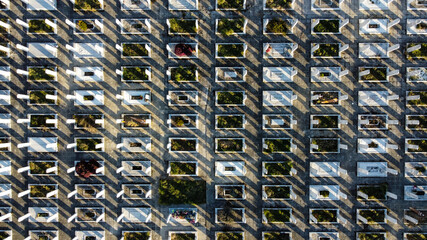 Aerial drone view of cemetery and graves. Graveyard, view from above. Marble graves in Memorial center. Rows of graves.