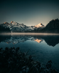 Lake Almsee with Mountain Reflection during Sunrise during Spring