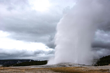 Old Faithful erupts at a given time each day in Yellowstone National Park.