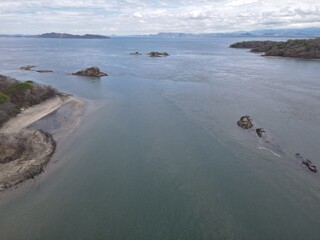 view of the beach with rocky islets in Costa Rica