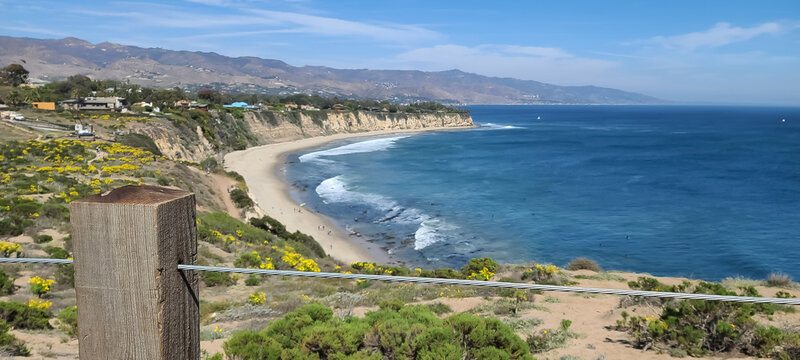 Malibu cove beach and blue ocean view from hiking trail at Point Dume