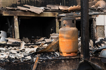 gas tank in a kitchen was burned, Fire insurance