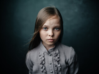 vintage portrait of a beautiful girl in a dress close-up cropped view