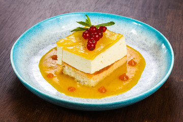 Traditional Cheesecake with orange sauce
