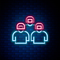 Glowing neon line Team of baseball players icon isolated on brick wall background. Colorful outline concept. Vector
