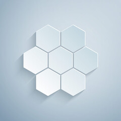 Paper cut Honeycomb icon isolated on grey background. Honey cells symbol. Sweet natural food. Paper art style. Vector