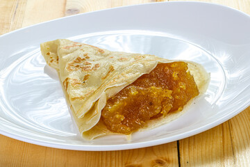 Delicous pancake with fruit jam