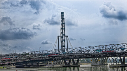Fototapeta na wymiar View of the Helix Bridge from the Marina Bay boulevard