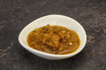 Green spicy sauce in the bowl