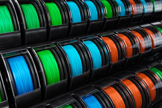 3d rendering the group various color of Polylactic Acid (PLA) filaments materials for 3d printing.