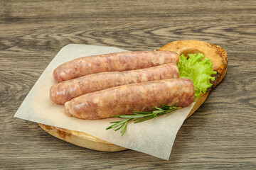 Raw pork meat sausages for grill