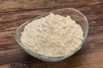 Wheat flour heap in the bowl