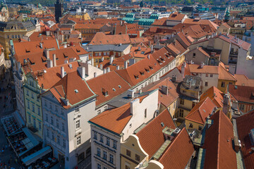 Fototapeta na wymiar Above the roofs of old Prague is a sunny April day. Czech Republic