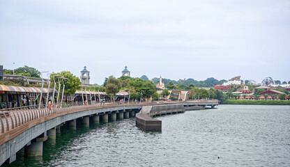  View of Sentosa Gateway. On the embankment tourists stroll