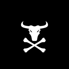 Skull of a bull icon isolated on dark background