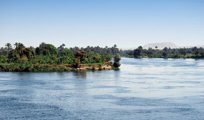 Obraz premium Cruising on Nile River. Nile river shore, southern Egypt. Africa