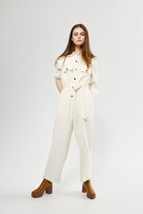 woman in trendy suit modern style jumpsuit isolated background