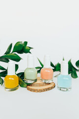 Tubes of colored nail polish close-up