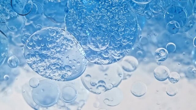 Macro Shot of Various Air Bubbles in Water Rising up on Light White Background. Liquid Cream Gel Transparent Cosmetic Sample Texture With Bubbles. Concept of Clean and Purity. High quality FullHD 