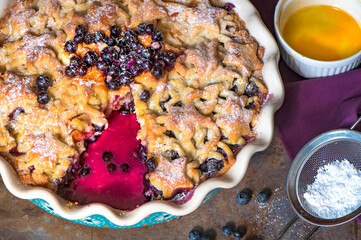 Homemade blueberry pie on a dark background