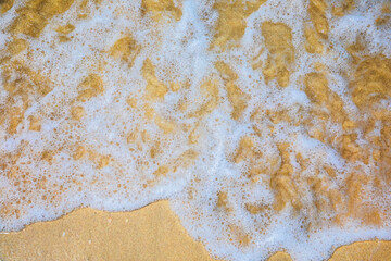 Rolling turquoise waves ashore in Dubai