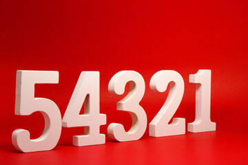 Counting numbers ( 1 2 3 4 5 ) white number wooden on Red Background with Copy Space - One Two Three Four Five 