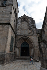 Fototapeta na wymiar Nossa Senhora da Oliveira church and two pedestrians