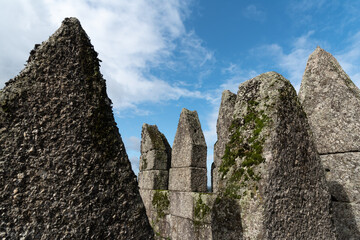 Guimaraes castle wall close up with blue sky copy space