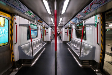 Empty metro train /  MTR subway train  late at night in Hong Kong - obrazy, fototapety, plakaty