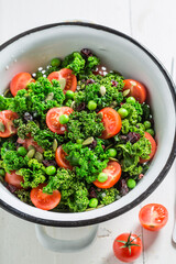 Salad with kale. Ingredients for green salad. Healthy spring salad.