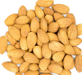 Fototapeta premium Raw almond closeup on white background. Natural organic nut kernel. Protein superfood or healthy snack. Almond pile scattered on white table top view. Golden almond package design. Healthy eating