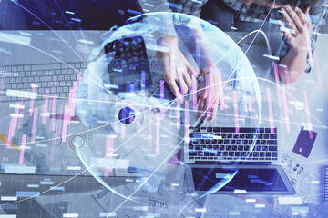 Double exposure of man and woman working together and financial graph hologram drawing. market analysis concept. Computer background. Top View.