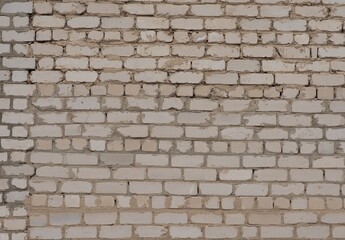 Brick wall. A wall that was being completed and attached to another wall. High quality photo