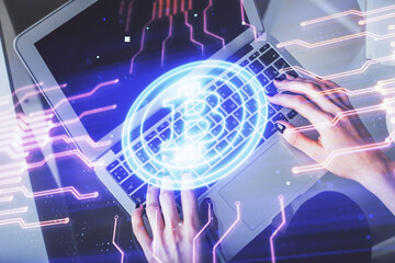 Double exposure of woman hands working on computer and blockchain theme hologram drawing. Top View. bitcoin cryptocurrency concept.