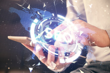 Multi exposure of man's hands holding and using a digital device and seo drawing. search...