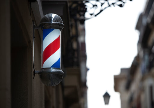 barber shop sign on the street
